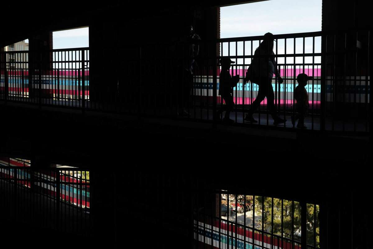 Fans walk down the ramps at AT&T Park on Opening Day.