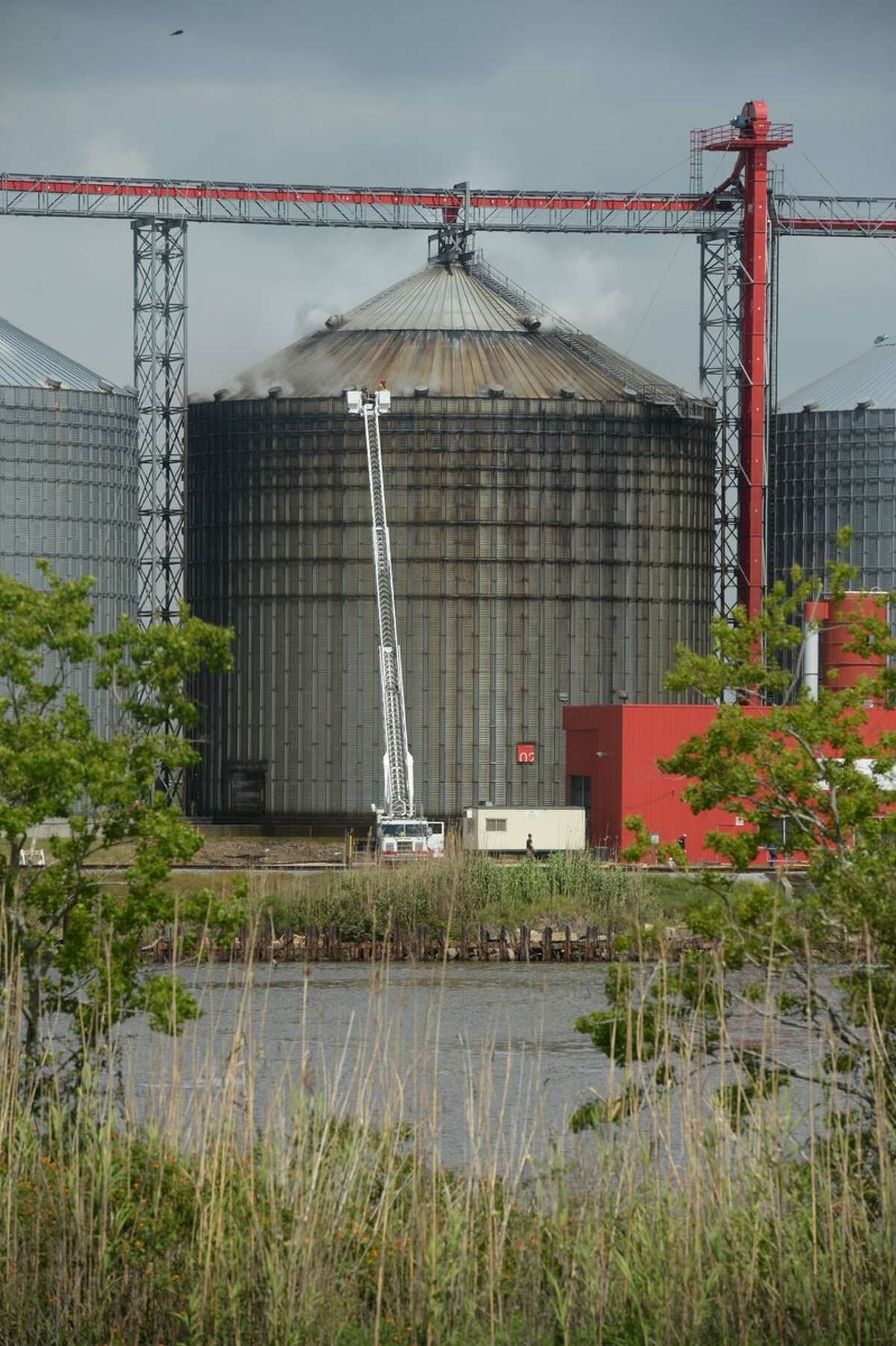 Smoke rises from a silo at the Port of Port Arthur on Monday morning. Guiseppe Barranco/The Enterprise