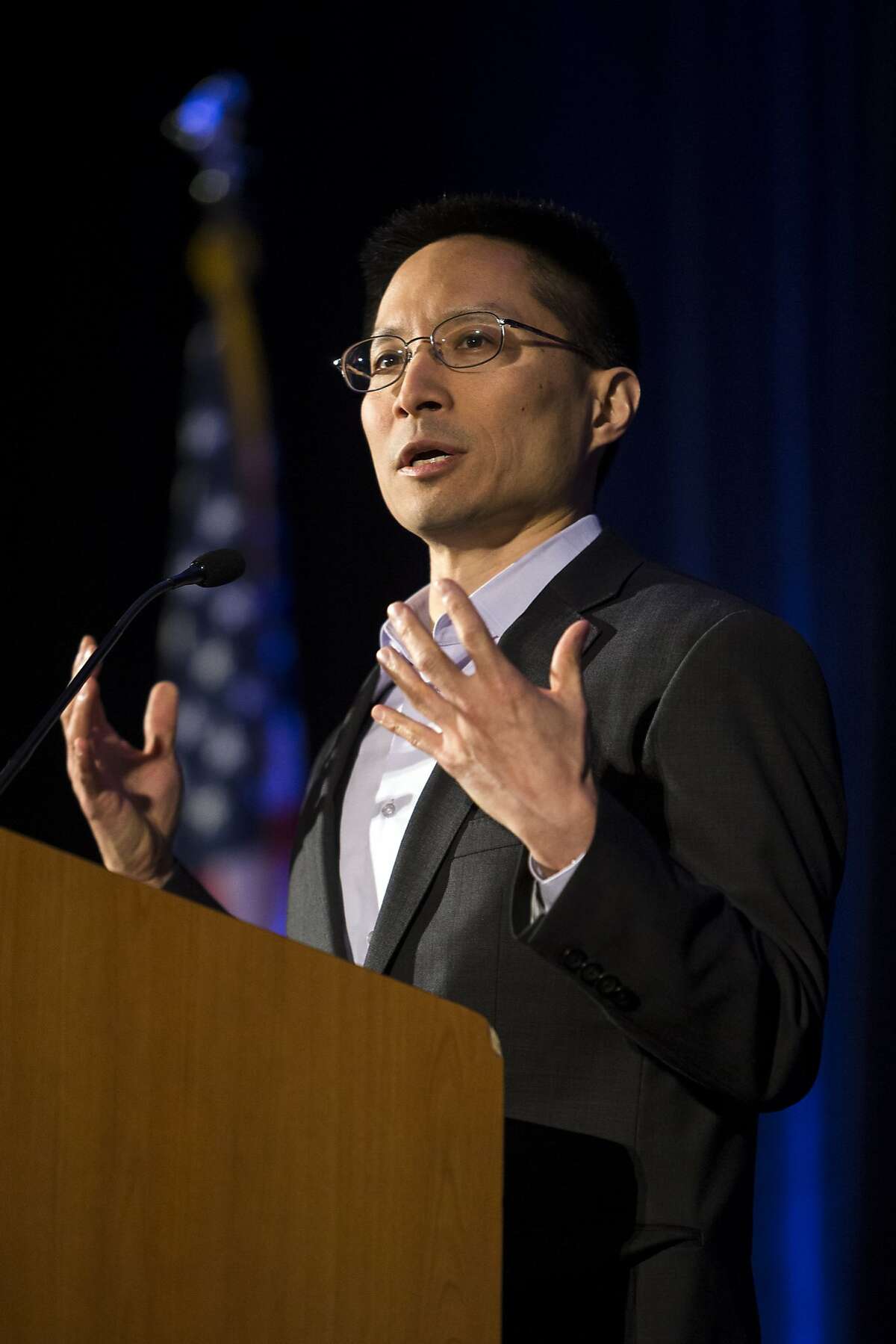 Eric Liu discusses the Background Check Initiative at the Washington Alliance for Gun Responsibility Luncheon Thursday, May 30, 2013, in the Grand Ballroom of the Seattle Westin Hotel in downtown Seattle. (Jordan Stead, seattlepi.com)