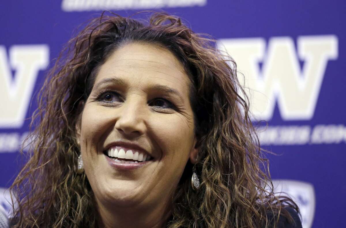 New Washington head coach Jody Wynn smiles as she speaks at a news conference introducing her Monday, April 17, 2017, in Seattle. Wynn comes to Washington from Long Beach State, where she was head coach for eight seasons. (AP Photo/Elaine Thompson)