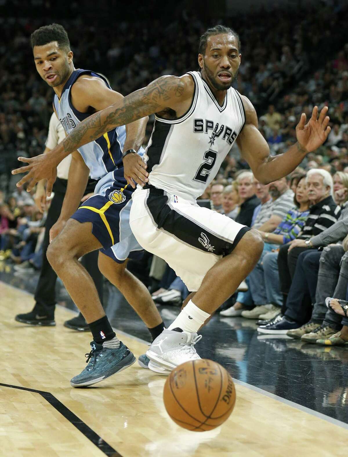 Memphis Grizzlies?• Andrew Harrison and San Antonio Spurs' Kawhi Leonard chase after a loose ball during first half action of Game 2 in the first round of the Western Conference playoffs held Monday April 17, 2017 at the AT&T Center.