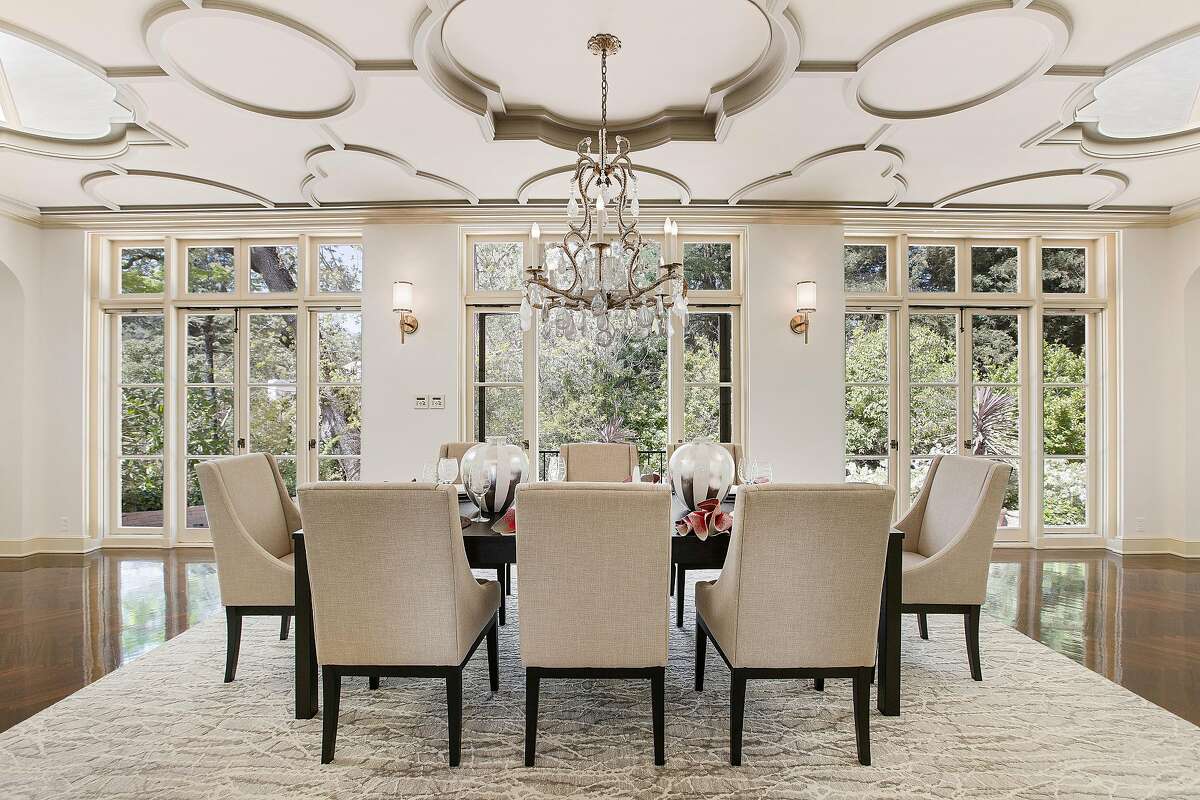 A sculpted ceiling covers the formal dining room.�