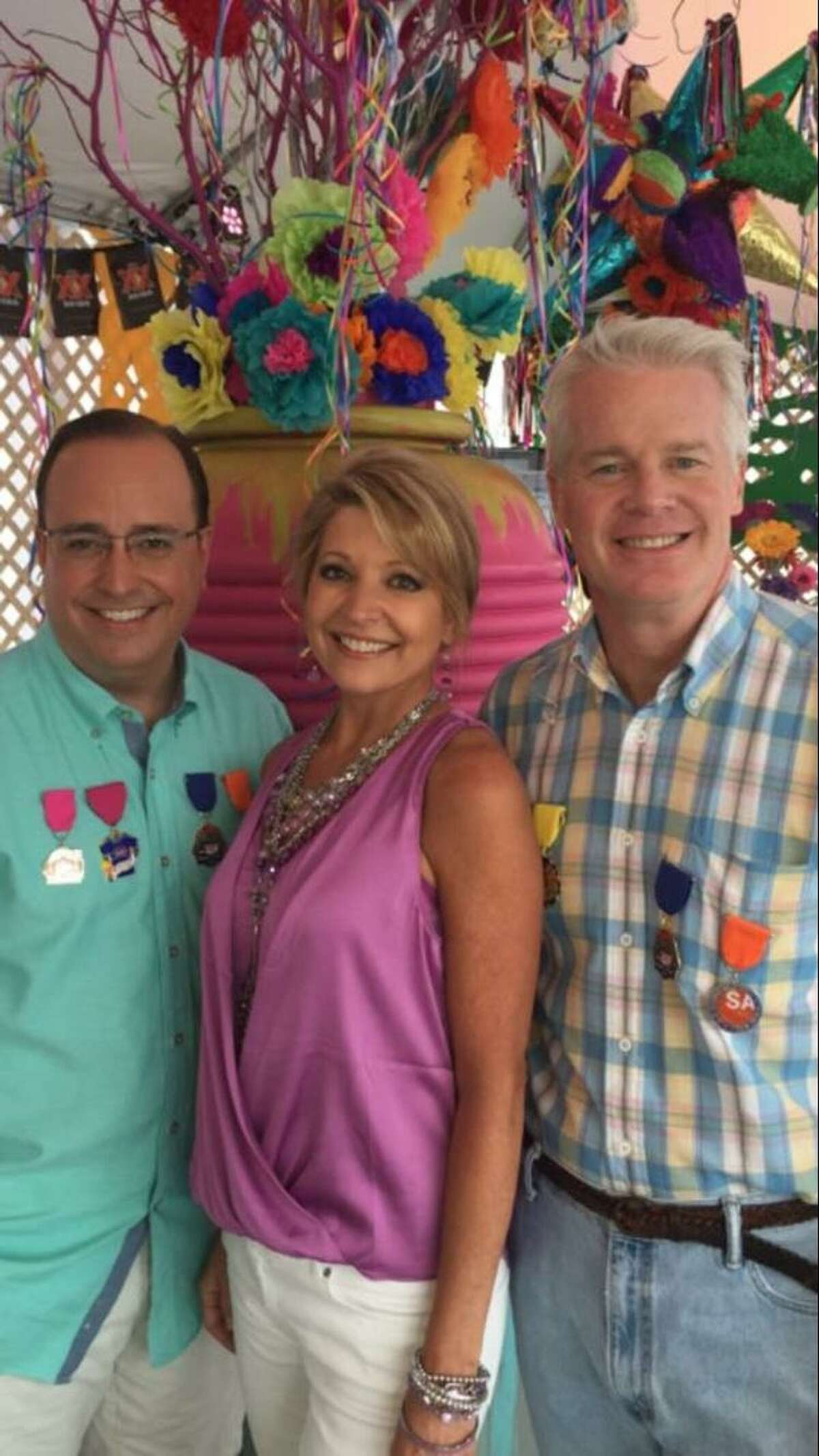 KSAT morning co-anchors Leslie Mouton and Mark Austin, left, and weathercaster Mike Osterhage, have been studying up for their Battle of Flowers duties Friday.