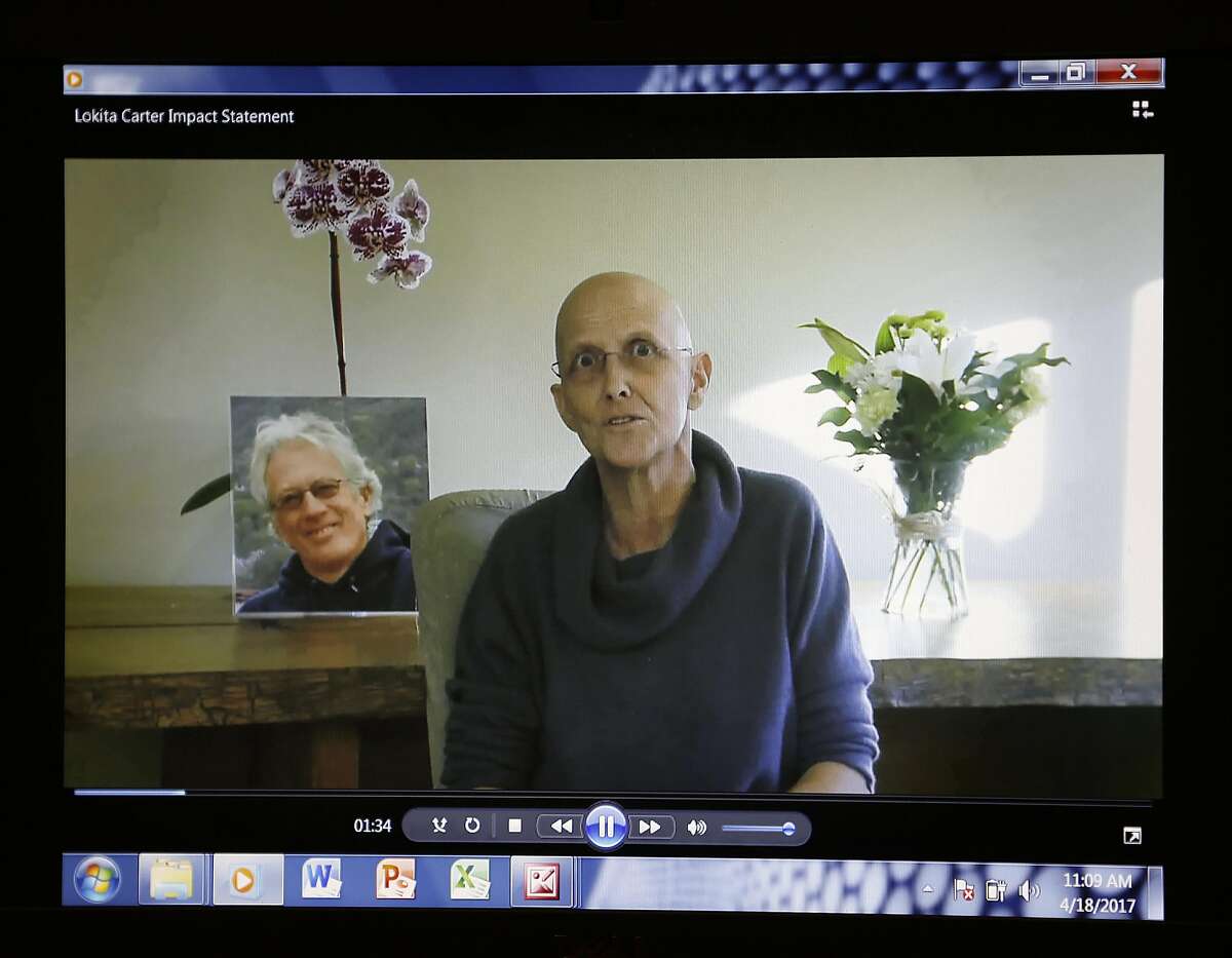 Lokita Carter, wife of deceased tantra yoga teacher Steve Carter speaks and shows a video while she was recovering from cancer at Marin County Hall of Justice on Tuesday, April 18, 2017, in San Rafael, Calif.