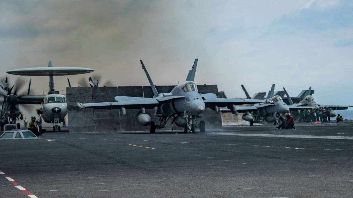 An F/A-18C Hornet prepares to launch from the aircraft carrier USS Carl Vinson during deployment in the Western Pacific, April 10, 2017. The photo was released by the U.S. Navy. With signs indicating that North Korea could be planning a nuclear or missile test as early as Saturday, April 15, 2017, a United States Navy strike group led by the Carl Vinson is steaming toward the Korean Peninsula in a show of force. (U.S. Navy photo by Mass Communication Specialist Seaman Jake Cannady via The New York Times)