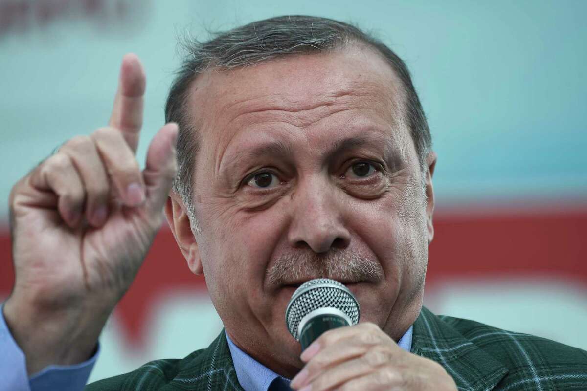 Turkey's President Recep Tayyip Erdogan speaks to supporters during the last rally ahead of Sunday's referendum, in Istanbul, Saturday, April 15, 2017. Turkey is heading to a contentious referendum on constitutional reforms to expand Erdogan's powers.(AP Photo/Lefteris Pitarakis)