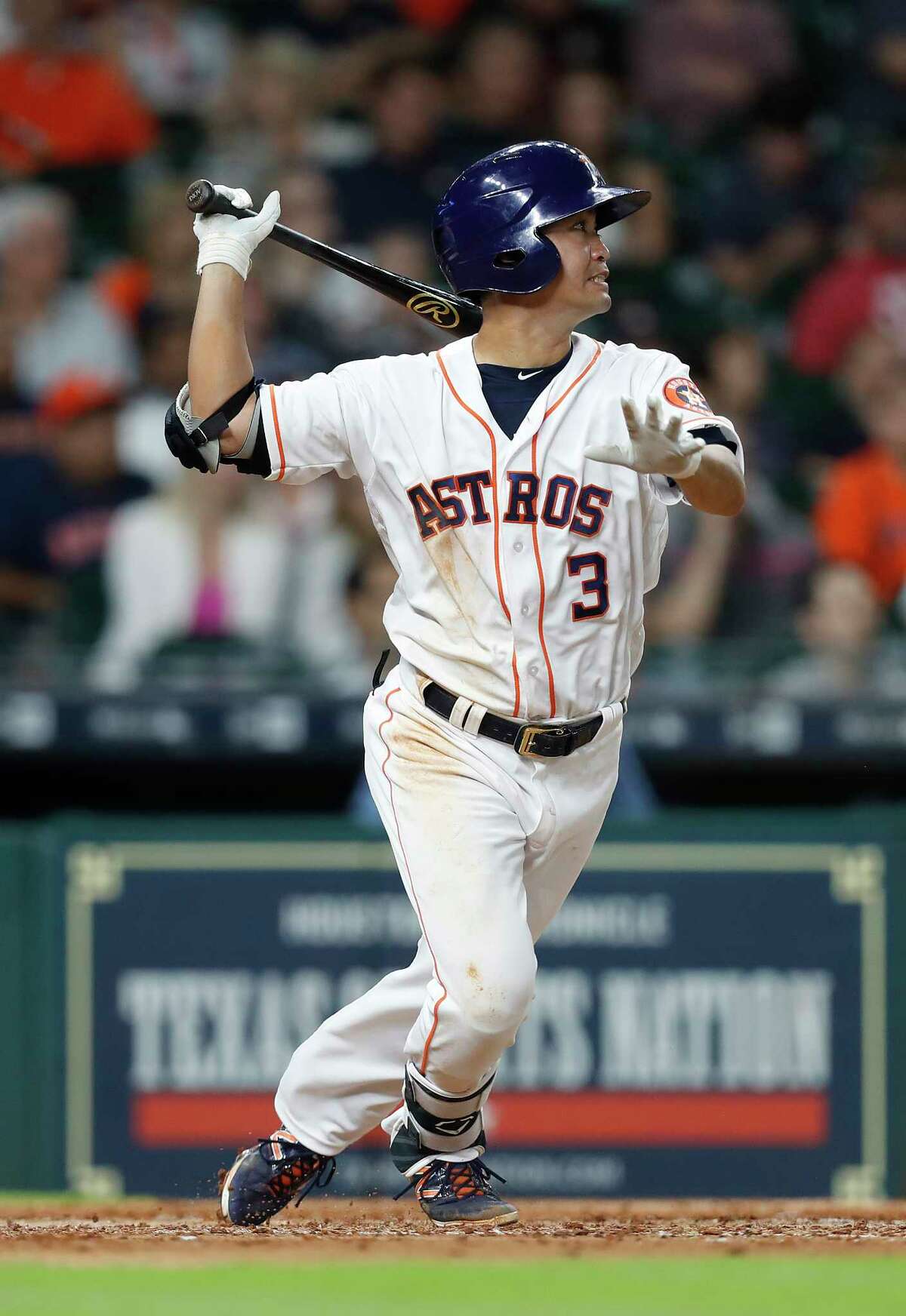 Houston Astros Norichika Aoki (3) singles during the seventh inning of an MLB baseball game at Minute Maid Park, Tuesday, April 18, 2017, in Houston.