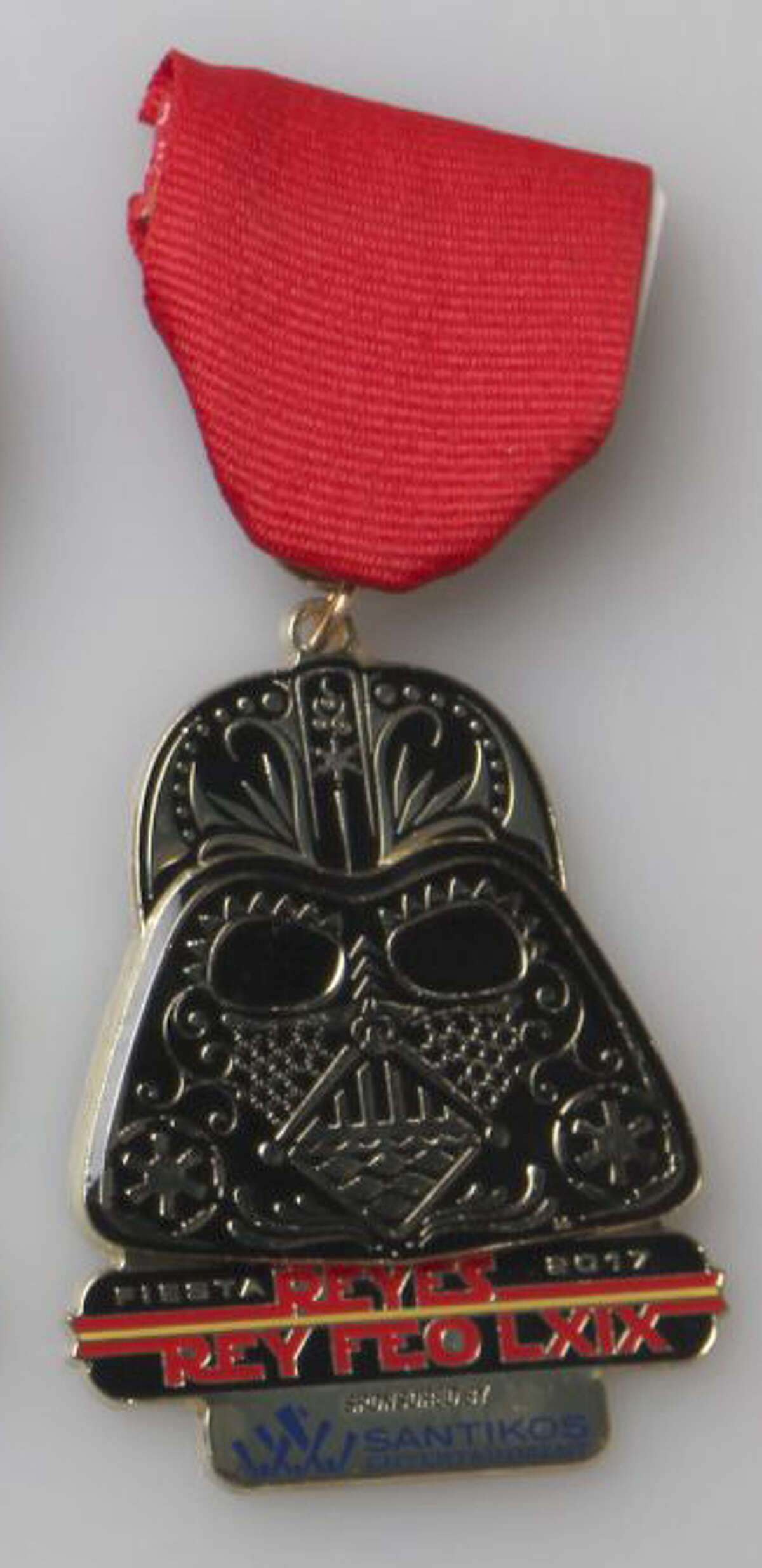 Rey Feo Fred Reyes?’ ?“Star Wars?” Fiesta medals are a force to be reckoned with this year. Sponsored by Santikos Entertainment, Reyes?’ medals consist of Darth Vader.