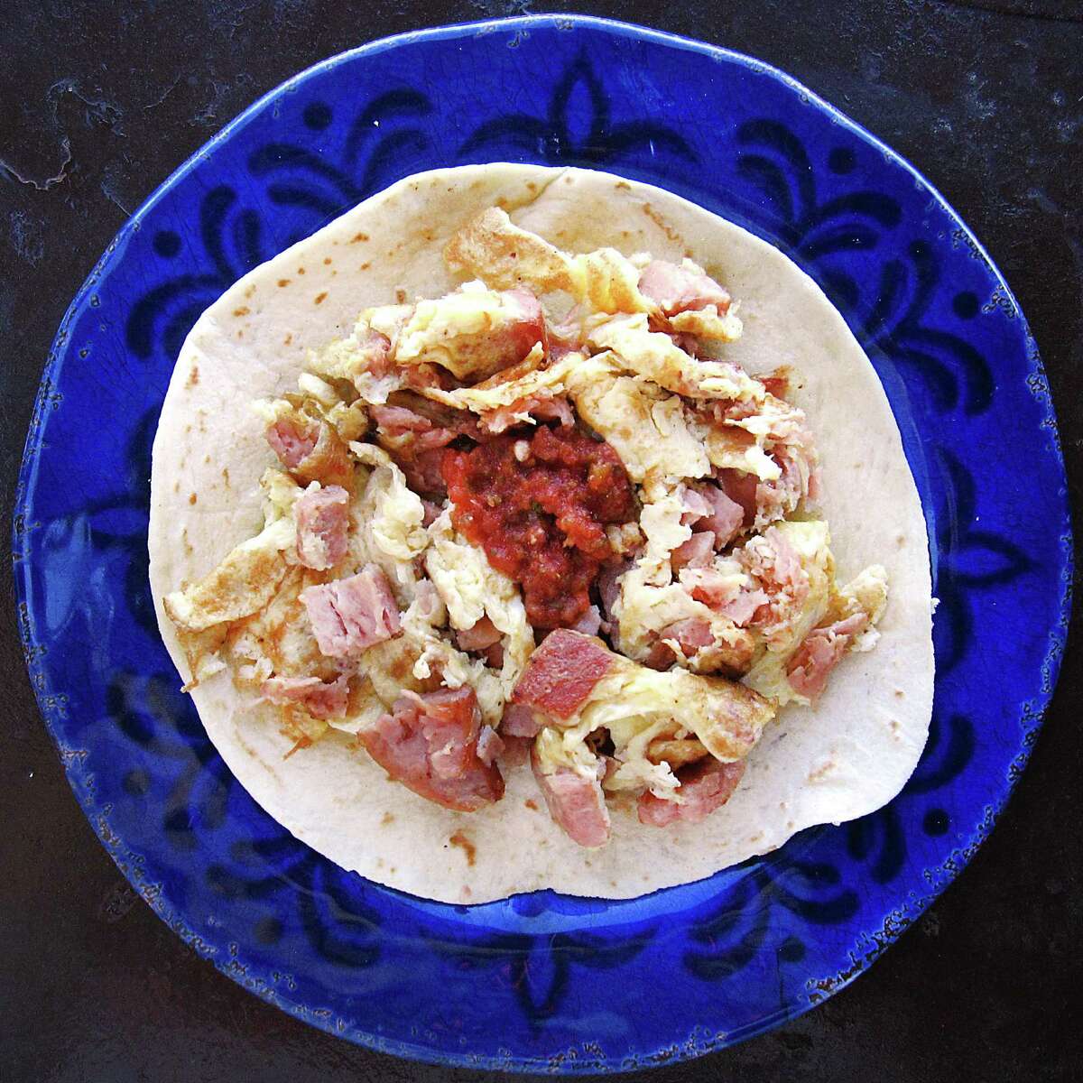 Spam and eggs taco on a handmade flour tortilla from Dos Jalisco Mexican Restaurant.