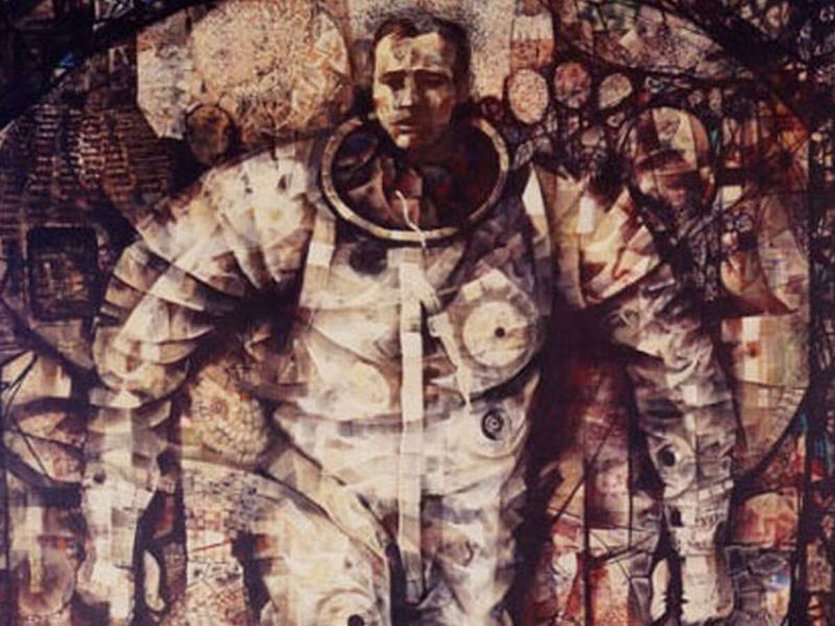 Description: In a silver-colored spacesuit, astronaut Gordon Cooper steps away from his Mercury spacecraft and into the bright sunlight on the deck of the recovery ship after 22 orbits of Earth. Mitchell Jamieson documented Cooper's recovery and medical examination and accompanied him back to Cape Canaveral.