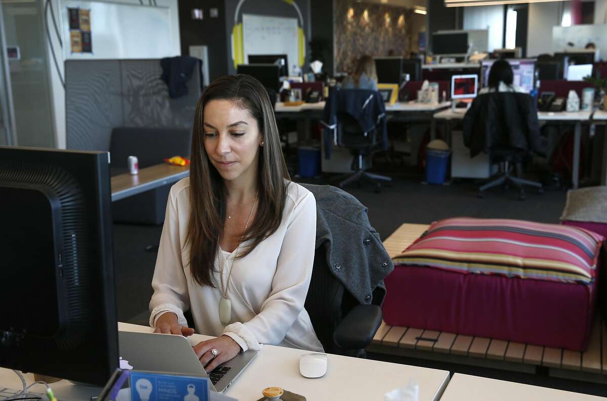 Victoria Makris works at her marketing department job at Box, Inc. after commuting by Caltrain in Redwood City, Calif. on Wednesday, April 19, 2017. Box is one of a few companies that has relocated to more transit-friendly environs and offers free Caltrain transit passes to its employees.