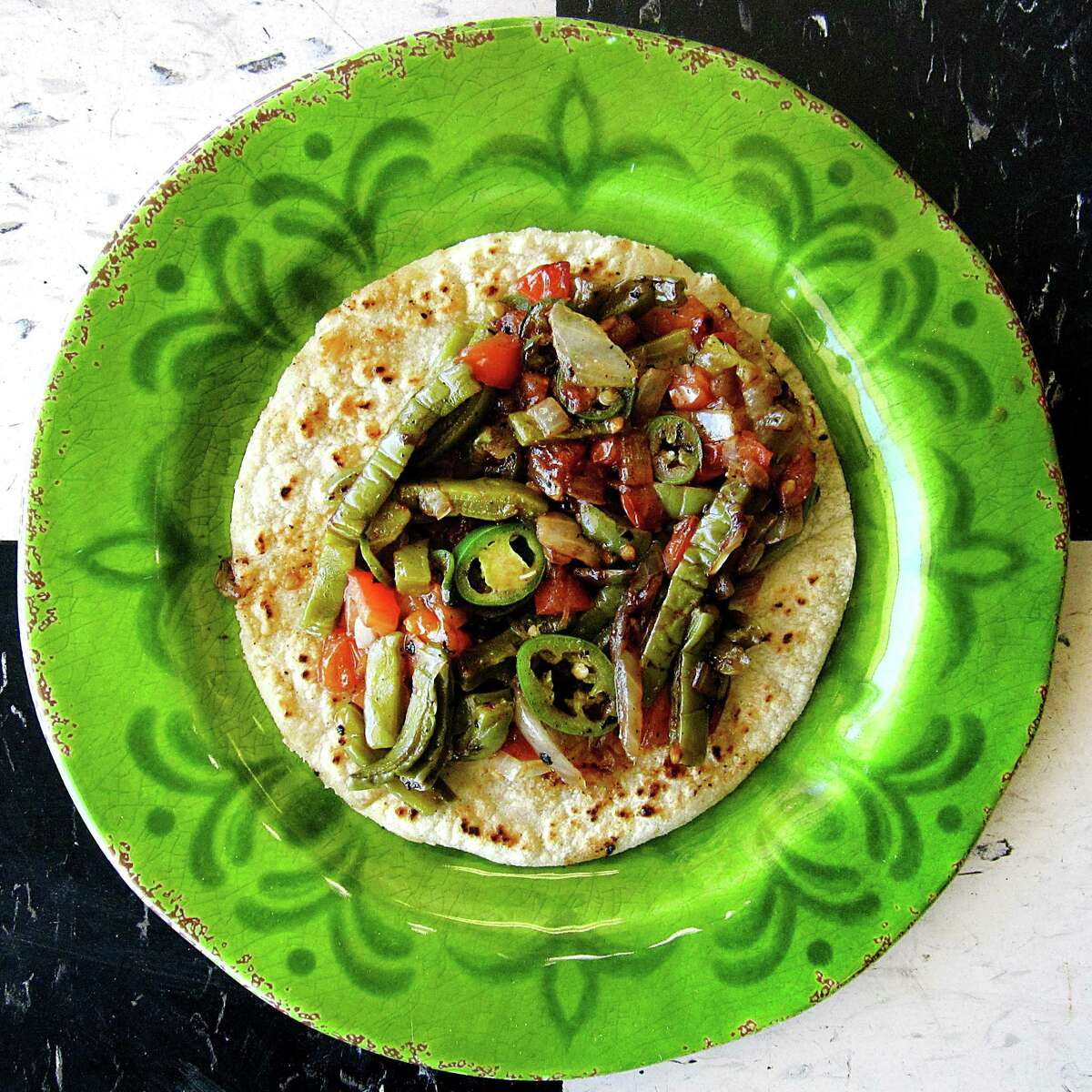 Taco of the Week: Nopales a la mexicana taco on a handmade corn tortilla from Salsa's Cafe.