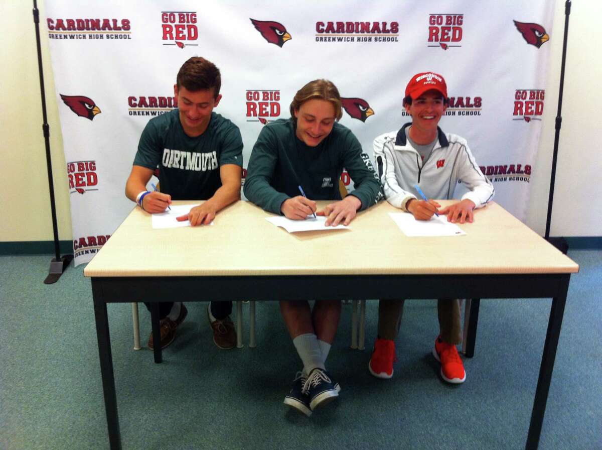 From left to right, Justin Sodokoff, Bailey Savio and Jimmy Catalano each signed National Letters of Intent to play Division I sports during a ceremony at Greenwich High School?’s Media Center. Sodokoff will dive at Dartmouth College, Savio will play lacrosse at Loyola Maryland and Catalano will compete on the crew team at the University of Wisconsin. April 19, 2017.