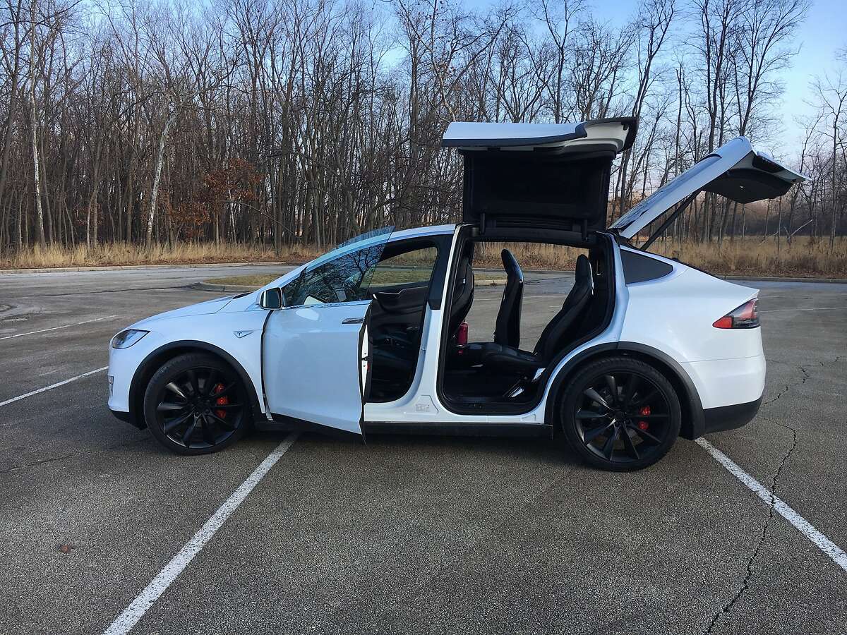 The Tesla Model X P100D all-electric three-row SUV hits 60 mph in 2.9 seconds and uses falcon wing doors to access the rear seats. (Robert Duffer/Chicago Tribune/TNS)