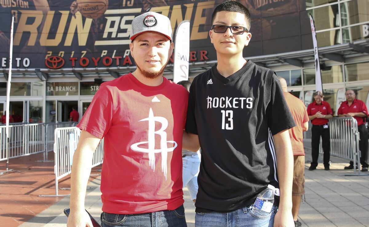 Fans pose for a photo before the Houston Rockets take on the Oklahoma City Thunder in Game 2 of the first-round playoff series at Toyota Center Wednesday, April 19, 2017, in Houston. ( Yi-Chin Lee / Houston Chronicle )