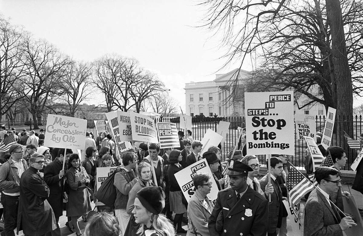 American youths stage a rally in November 1965 in front of the White House in Washington, D.C. protesting United States military involvement in the Vietnam War.