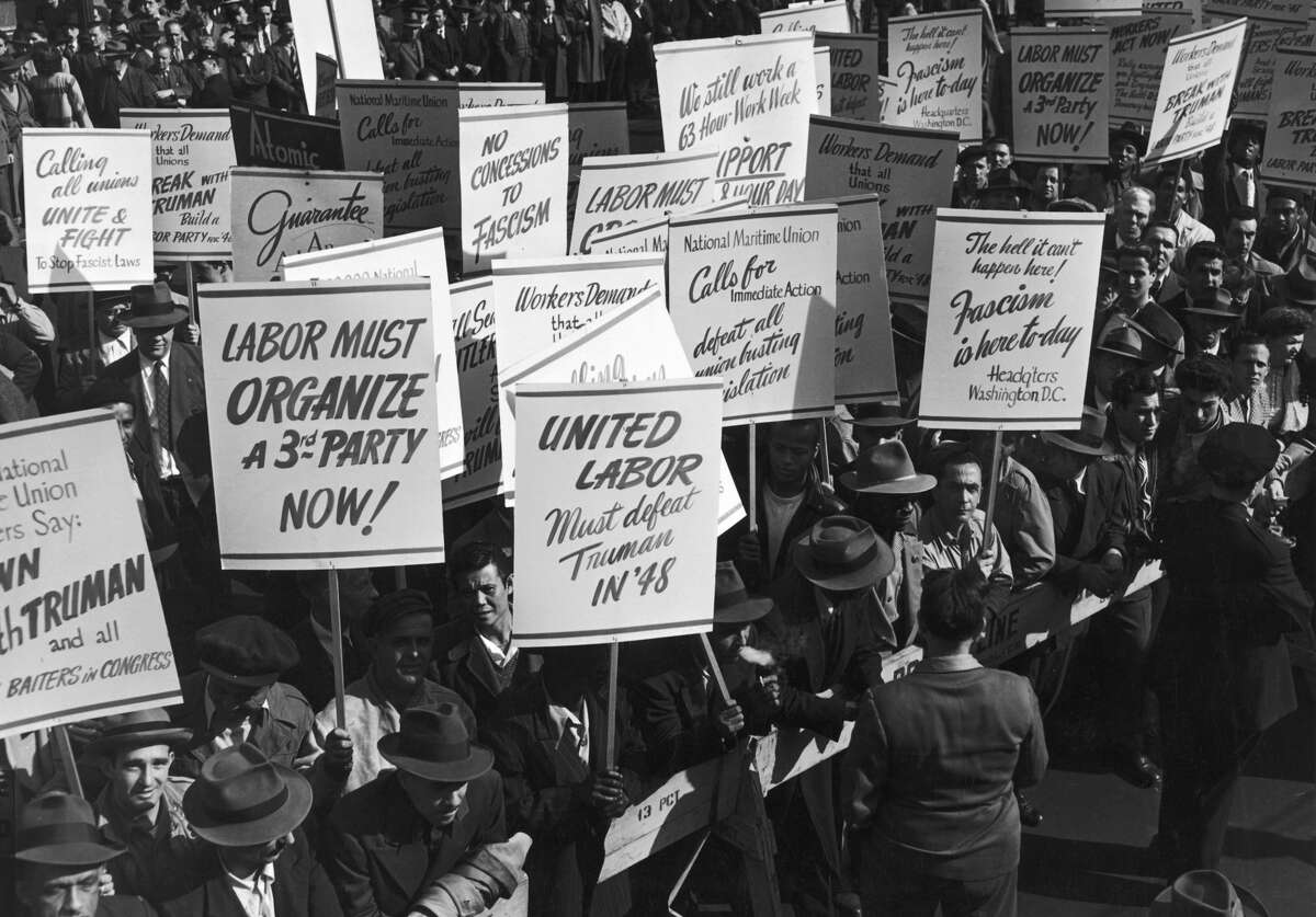 A mass demonstration in New York voices the workers' protest against President Harry S. Truman's threat to draft striking workers into the armed forces, 1946.