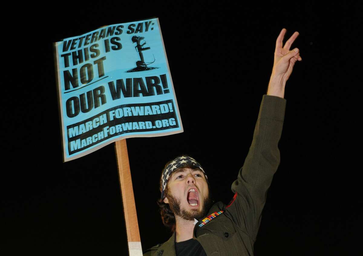 Iraq veteran and anti-war protester Ryan Endicott protests against the announcement of a US troop increase for Afghanistan, at an anti-war protest in Los Angeles on December 2, 2009.