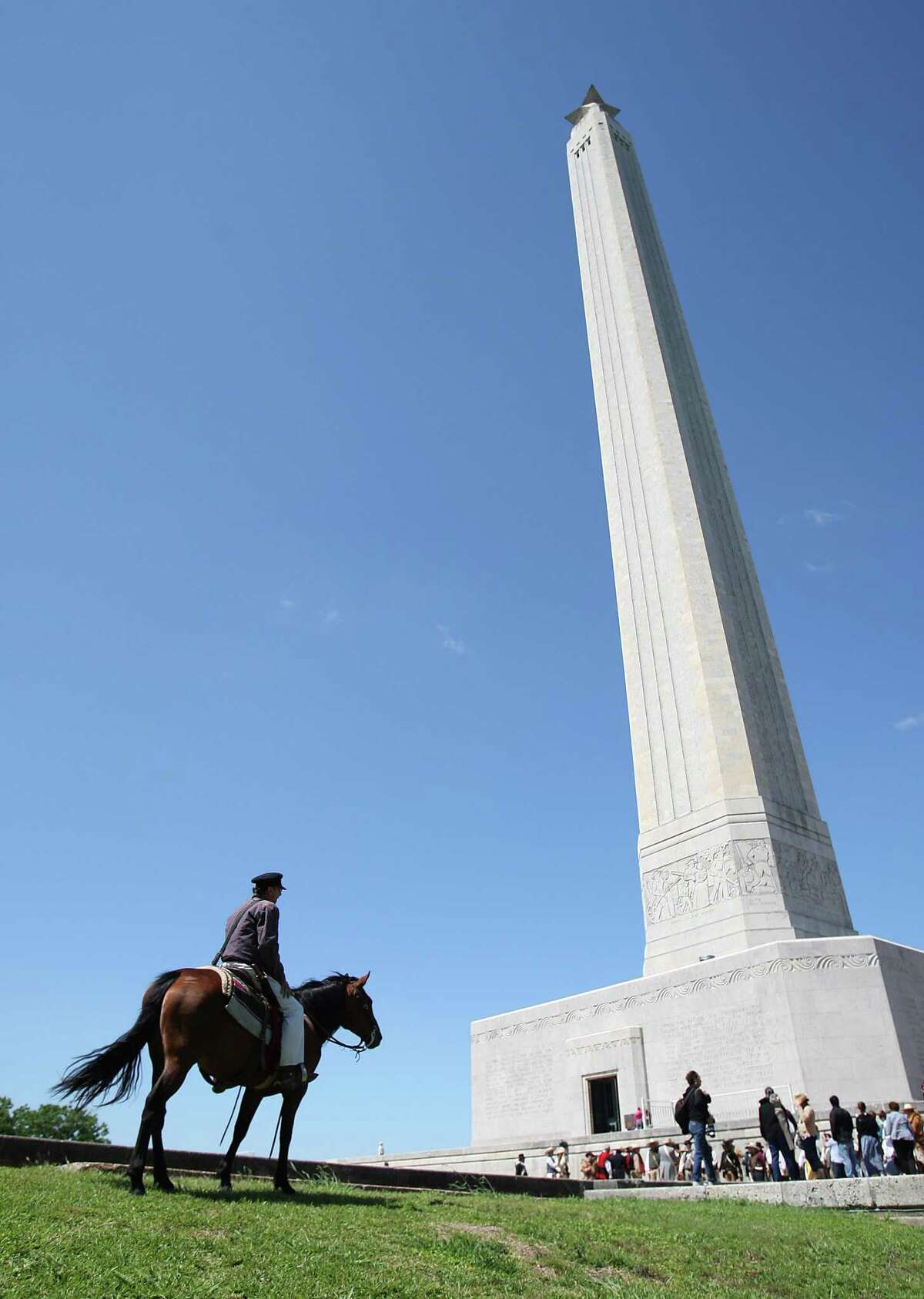 A Texas Army re-enactor sits on his horse near the San Jacinto Monument during festivities commemorating the anniversary of the Battle of San Jacinto.