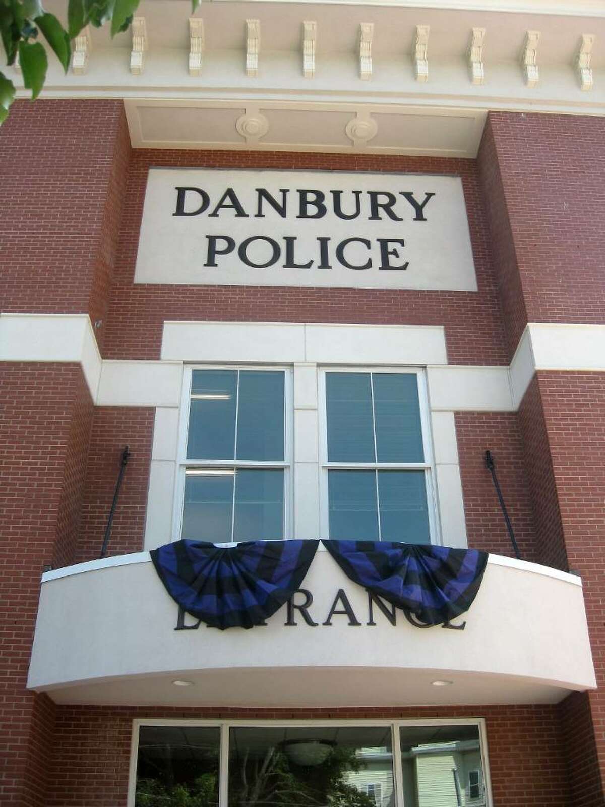 Memorial bunting was placed at the entrance of police headquarters Friday, June 4, 2010 in honor of officer Donald Hassiak who was killed in a hit and run accident Thursday night.