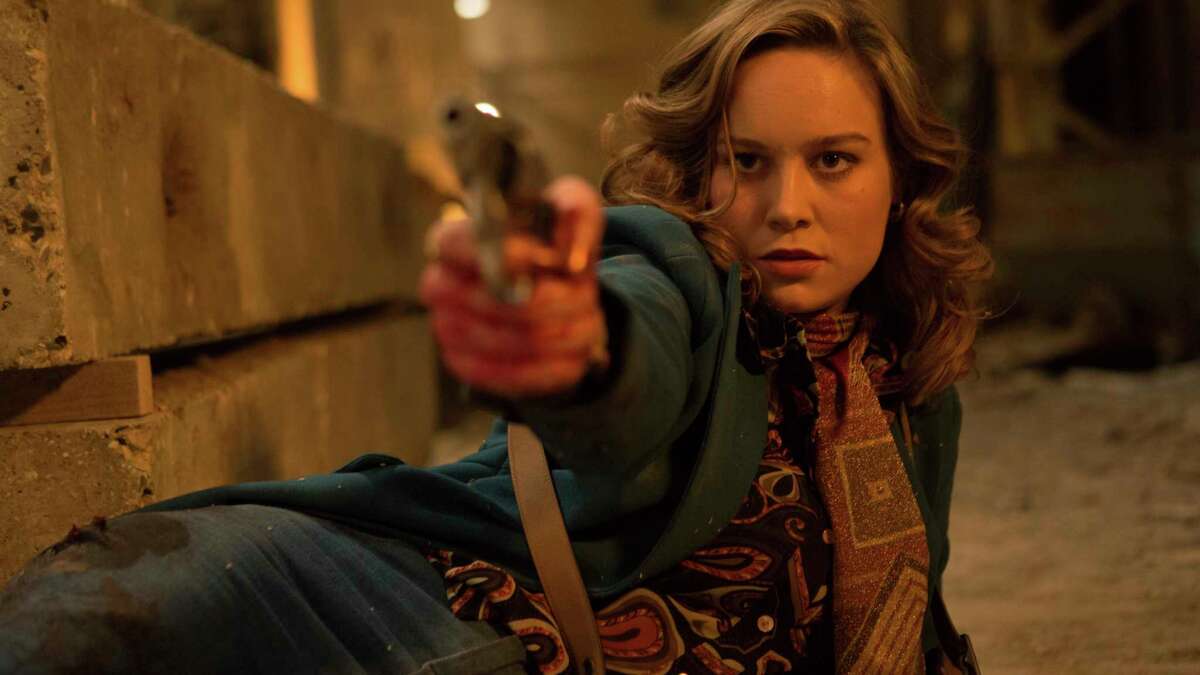 This image released by A24 shows Brie Larson in a scene from "Free Fire." (Kerry Brown/A24 via AP)