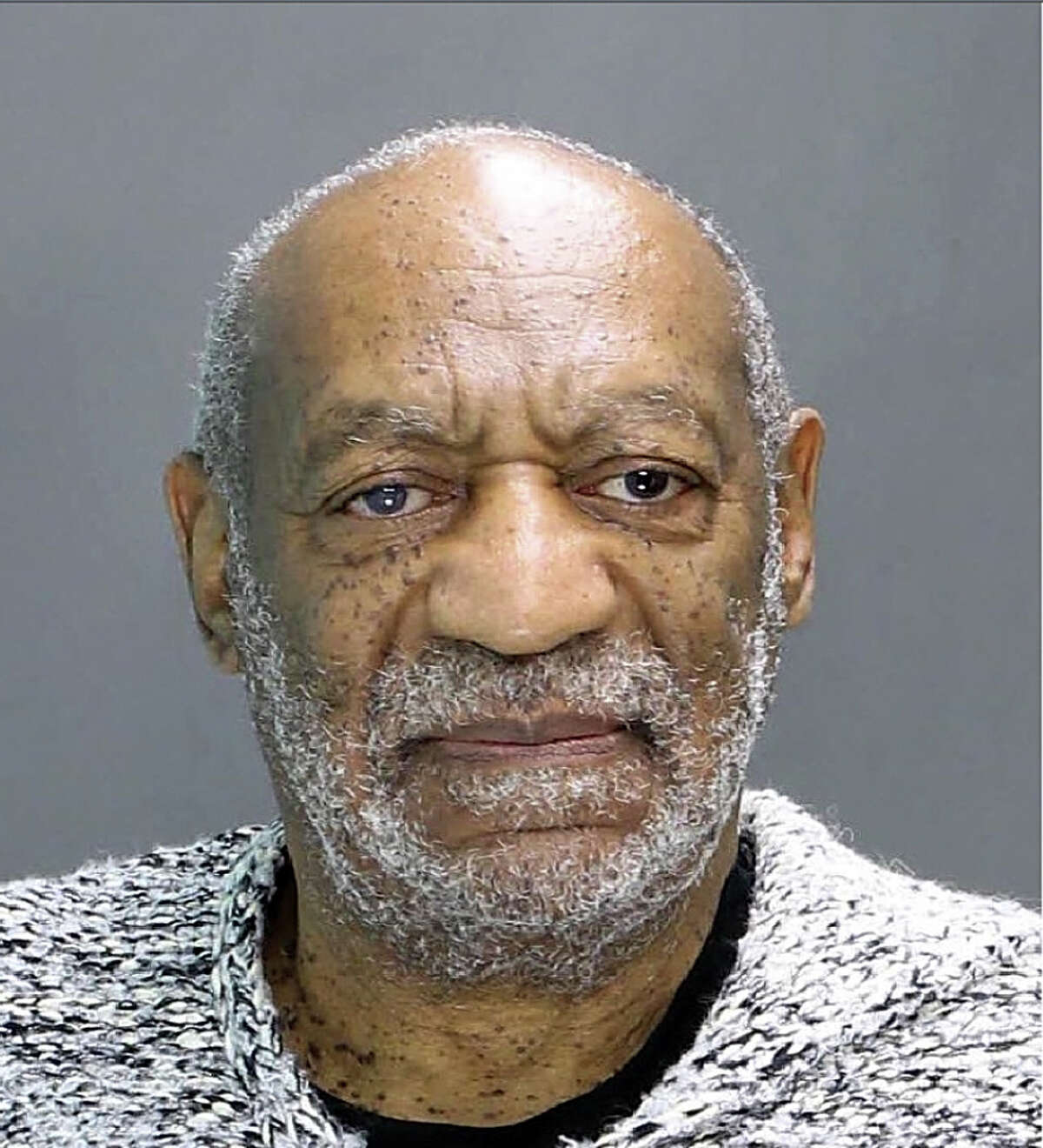 Bill Cosby This shot was taken when Cosby turned himself in on a charge of aggravated indecent assault for an alleged encounter in 2004. At least 35 women have accused Cosby of assaulting them.