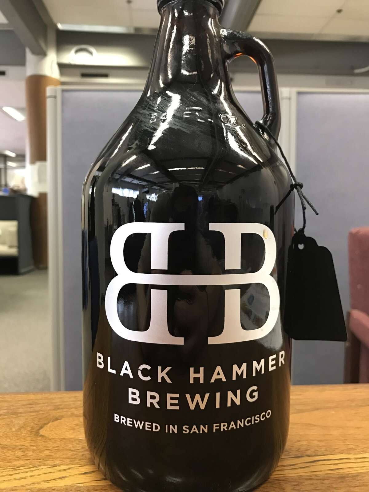 A growler of Black Hammer Brewing's Toke Back Mountain.