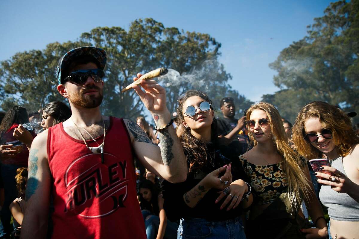 From the left, Cody Frantz, Kayla Gee, Kara Dorton and Rheanna Patton take part in the finale on 4:20 pm during the annual 420 celebration on Hippie Hill at Golden Gate Park in 2017.