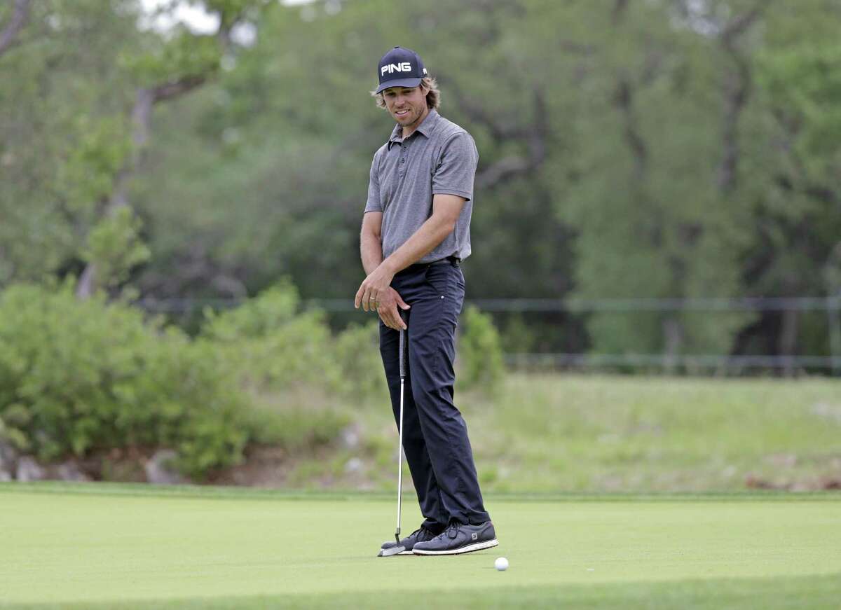 Aaron Baddeley stares in disbelief as his ball stops on the opposite side of the hole at the first green during the first round of the Valero Texas Open at TPC San Antonio Oaks Course on April 20, 2017.