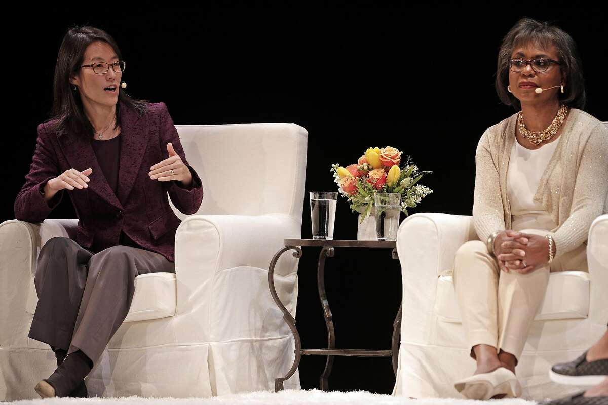 Ellen Pao, left, answers a question as Anita Hill listens on stage during a conversation about sexual harassment, workplace discrimination and other issues facing women in the workplace at the Nourse Theater in San Francisco, Calif., on Thursday, April 20, 2017. The event was hosted by the Kapor Center for Social Impact.