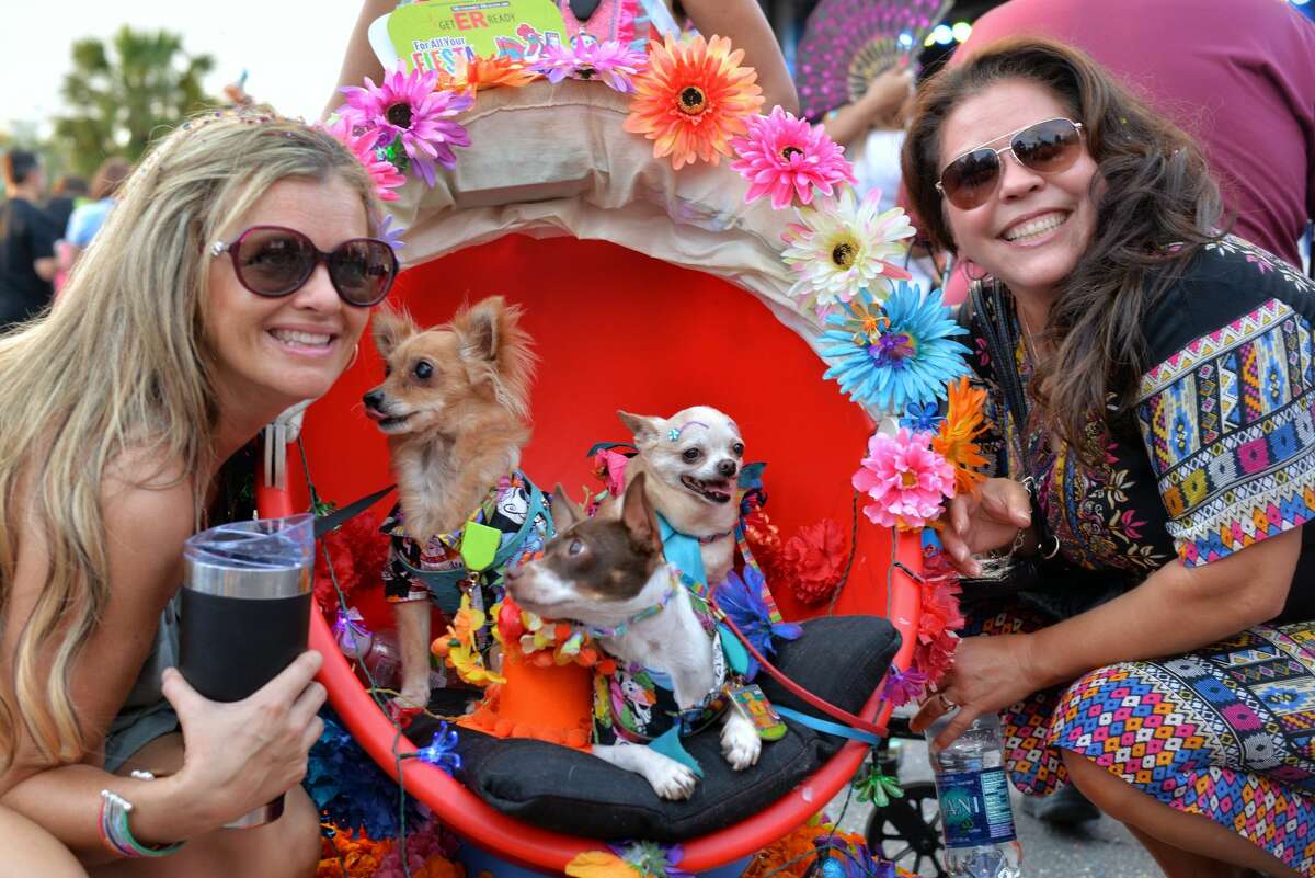 Fiesta-goers celebrate the pack Hemsifair Park on April 20 for Fiesta Fiesta, the event that signals the beginning of Fiesta 2017. Fiesta Fiesta featured dozens of medals at Pin Pandemonium, live music and more.