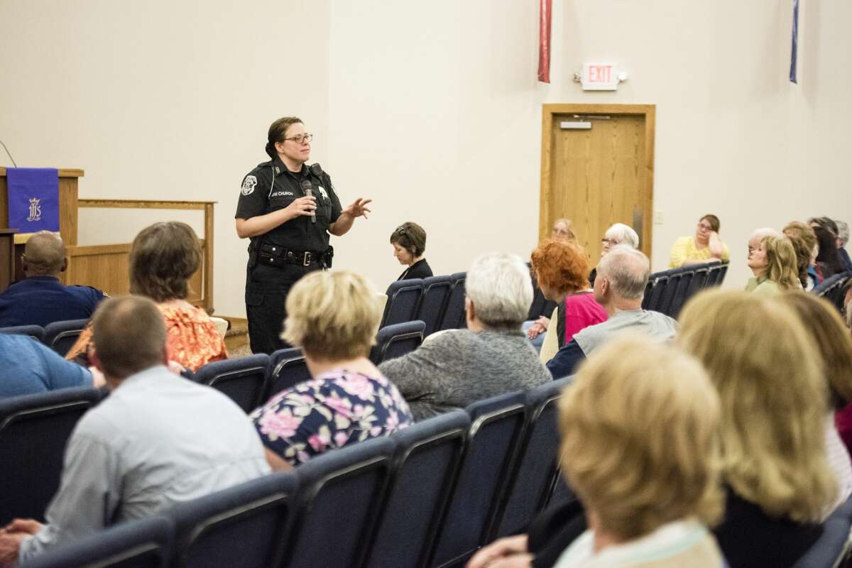 DANIELLE McGREW TENBUSCH | for the Daily News Coleman Police Sgt. Julie Church shares her experience working with the community during a Human Trafficking Seminar at Faith United Methodist Church in Coleman on Wednesday. "The biggest issue we run into is girls with low self-esteem," she said. "Someone can come in and tell them that they like (the girl,) that she's cute, and it quickly becomes a dependency." Church stressed that parents and those who work with youth should seek to build up their confidence and help them feel valued.