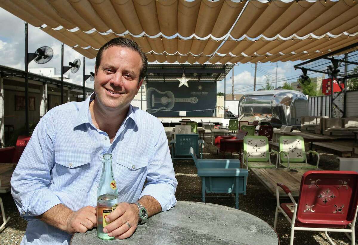Levi Goode, owner of Goode Company restaurants, on the patio of Armadillo Palace.