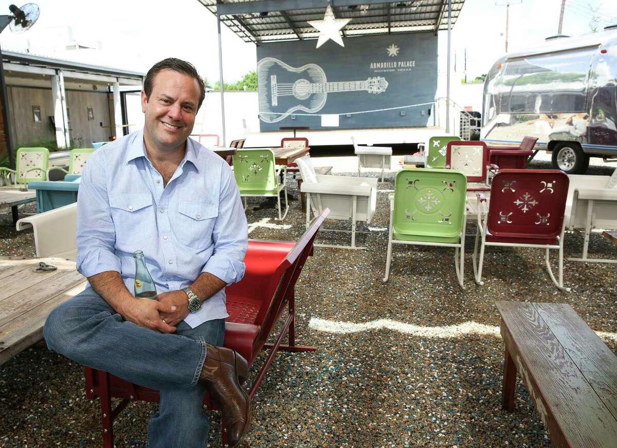 Levi Goode, owner of Goode Company restaurants, on the patio of Armadillo Palace.