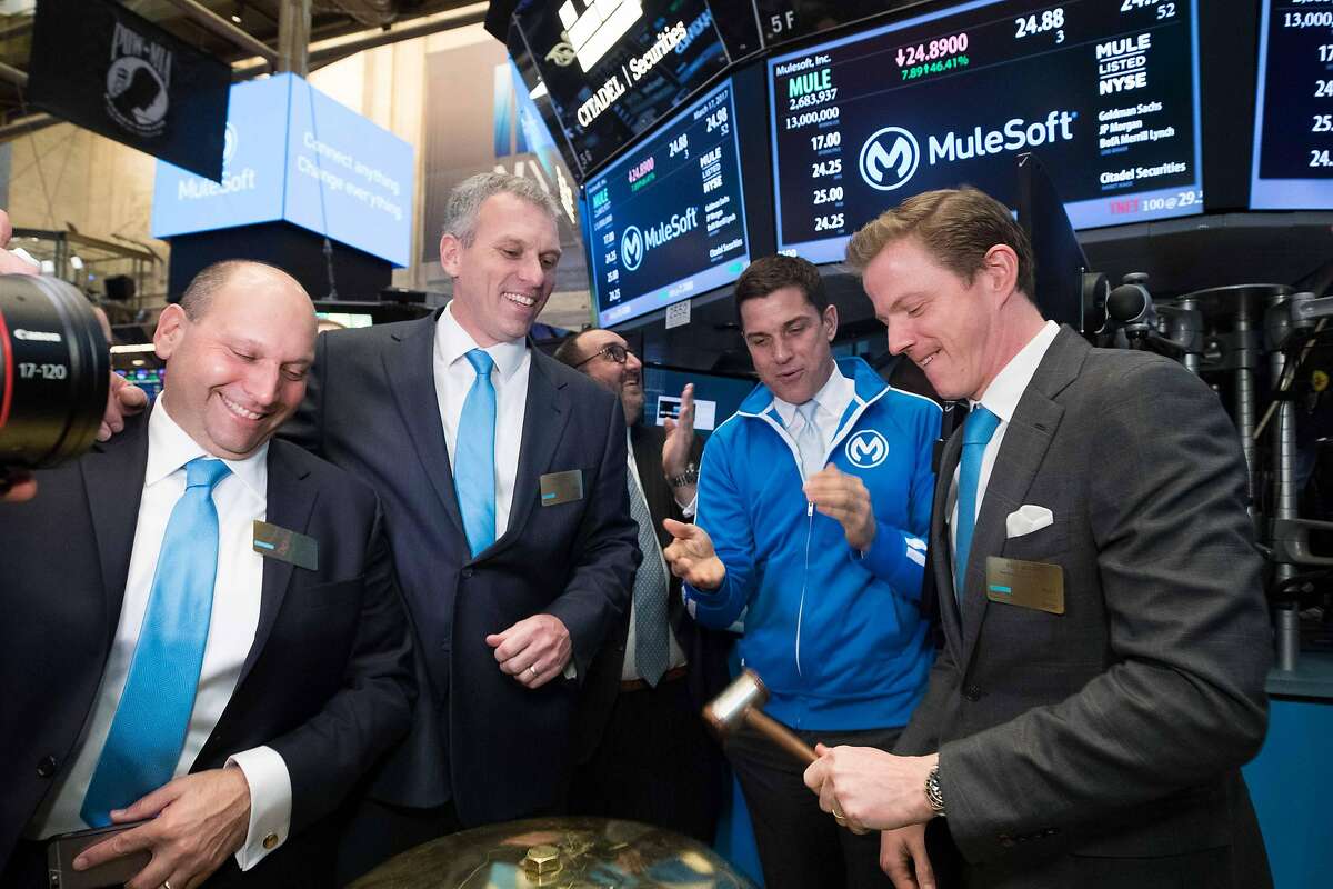 On Friday, March 17th, executives and guests of MuleSoft, Inc. (NYSE:MULE) visit the New York Stock Exchange (NYSE) to celebrate their IPO. To mark the occasion Chairman & Chief Executive Officer, Greg Schott, along with Founder, Ross Mason, ring the Opening Bell.�Pictured from left to Right: Simon Parmett (President, Field Operations), CEO Greg Schott, NYSE President Tom Farley and Founder Ross Mason.