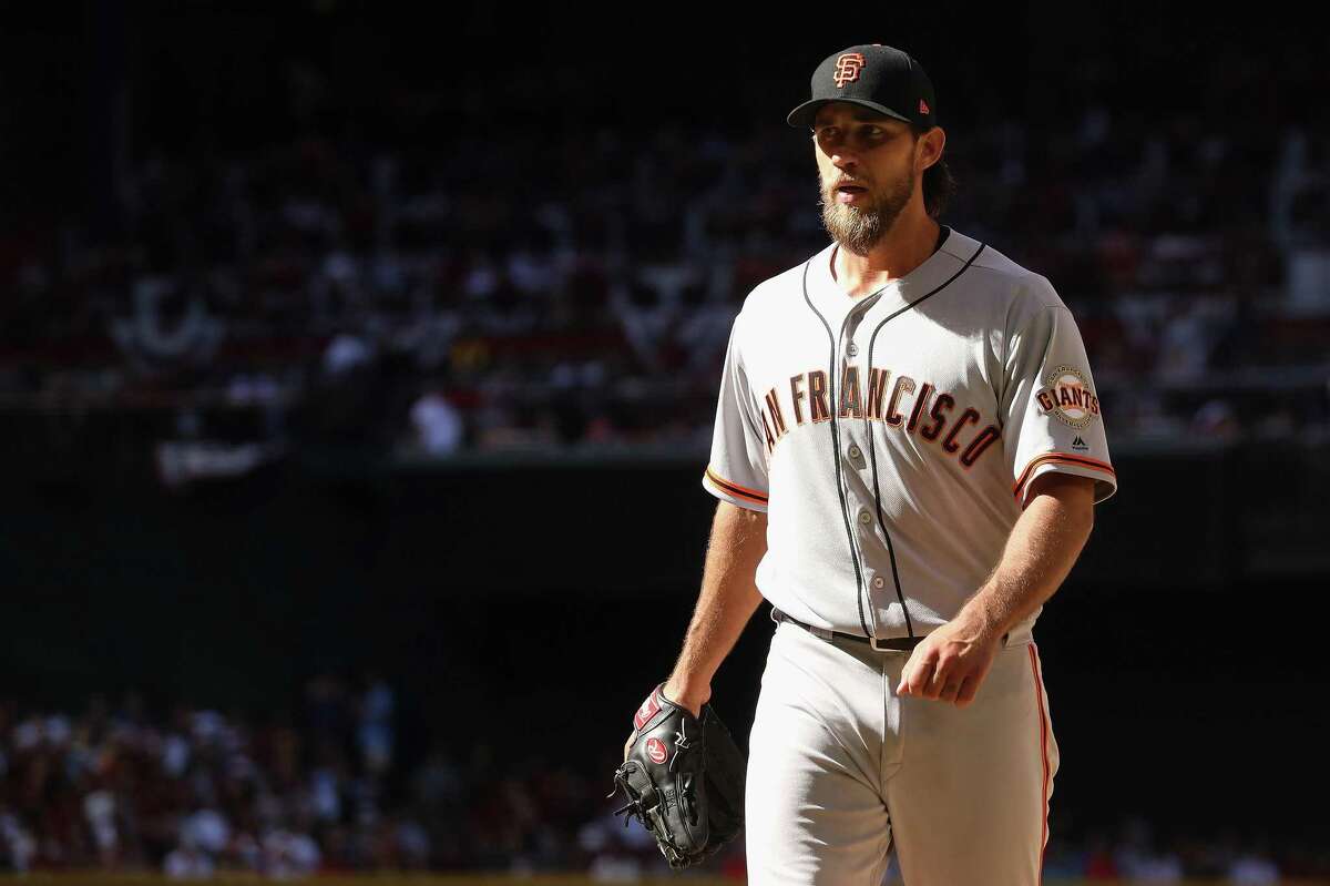 PHOENIX, AZ - APRIL 02: Starting pitcher Madison Bumgarner #40 of the San Francisco Giants walks off the mound during the MLB opening day game against the Arizona Diamondbacks at Chase Field on April 2, 2017 in Phoenix, Arizona. (Photo by Christian Petersen/Getty Images)