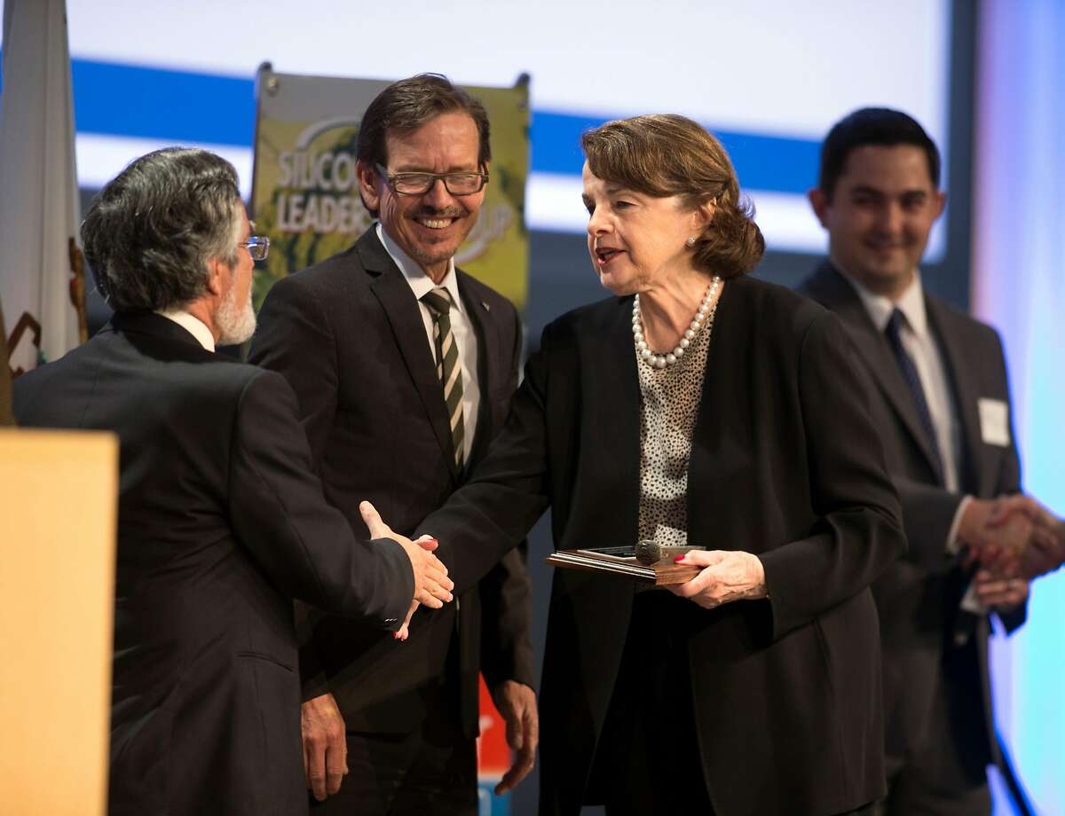 U.S. Sen. Dianne Feinstein, right, greets Aaron Peskin, chairman of SFCTA, left, and Robert Raburn, board vice president of BART, before speaking to an audience at the Silicon Valley Leadership Group on Friday, April 21, 2017 in Sunnyvale, Calif.