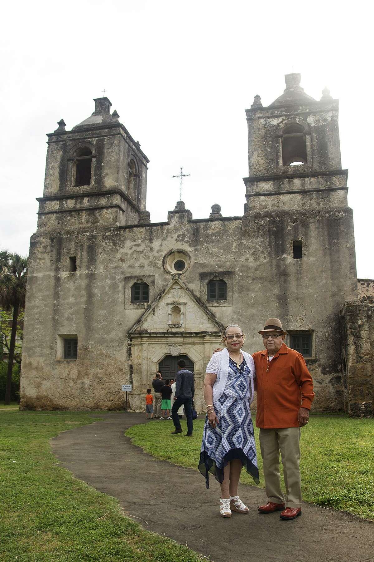 Janie and Domingo Rios in front of Mission Concepción.