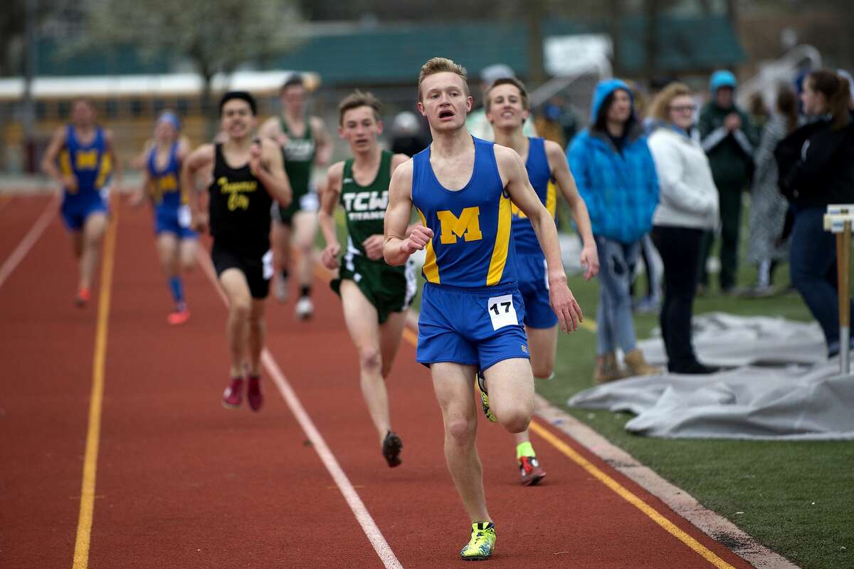 BRITTNEY LOHMILLER | blohmiller@mdn.net Midland's Nathan Streitmatter races to the finish line while competing in the 4x6400 relay during the Graves/Swayze Relays Friday afternoon at the Midland Stadium.