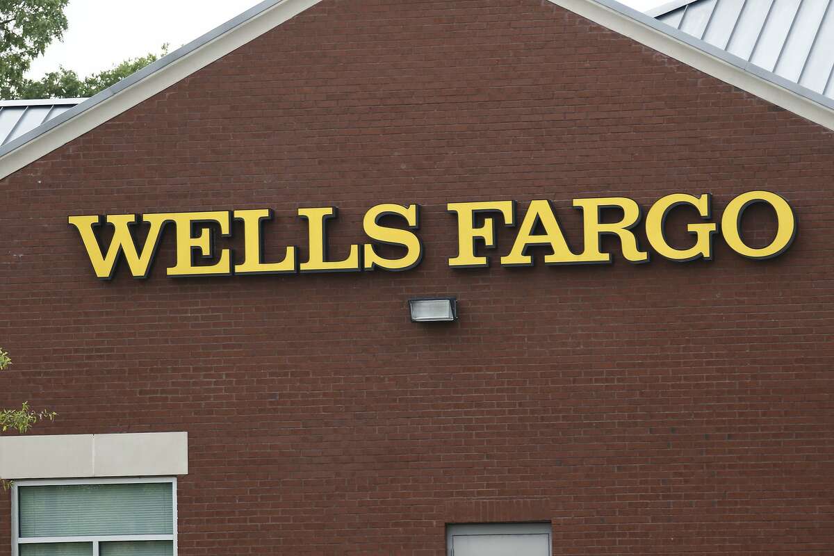 This April 11, 2017, photo shows a Wells Fargo bank in northeast Jackson, Miss. On Friday, April 21, 2017, Wells Fargo agreed to expand a recently settled class-action lawsuit by an additional $32 million as well as extend claims for fraudulent accounts that may have been opened going back to 2002. (AP Photo/Rogelio V. Solis)
