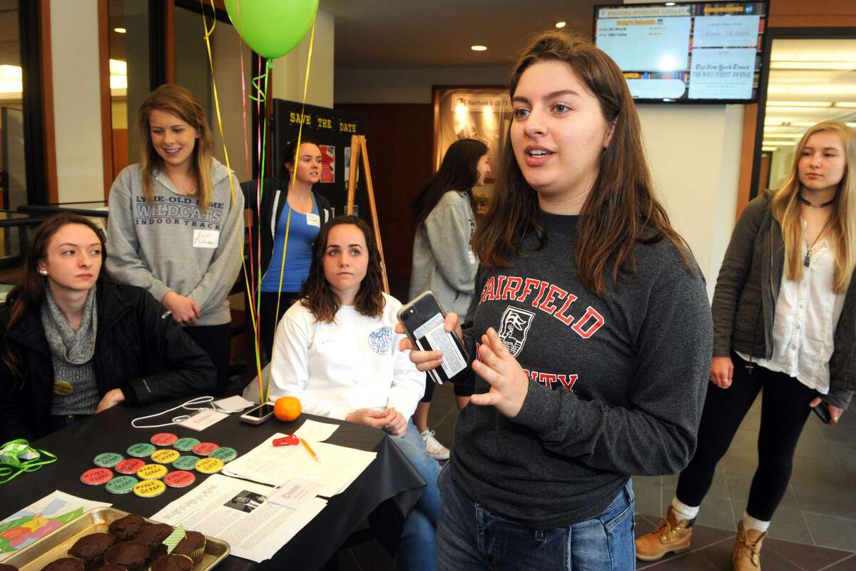Jessica Held, a Fairfield University sophomore from South Pelham, NY speaks with other students during a cupcake give away to bring attention to the plight of Dr. Bekele Gerba, a political activist currently in prison in Ethiopia.