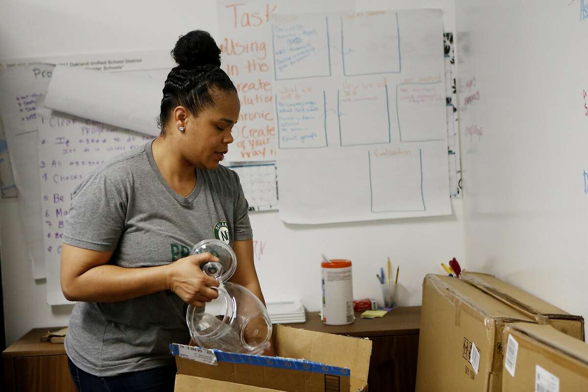 Tatiana Larkin, the COO of Oakland Natives, packs up items in the office on Friday, April 21, 2017, in Oakland, Calif.