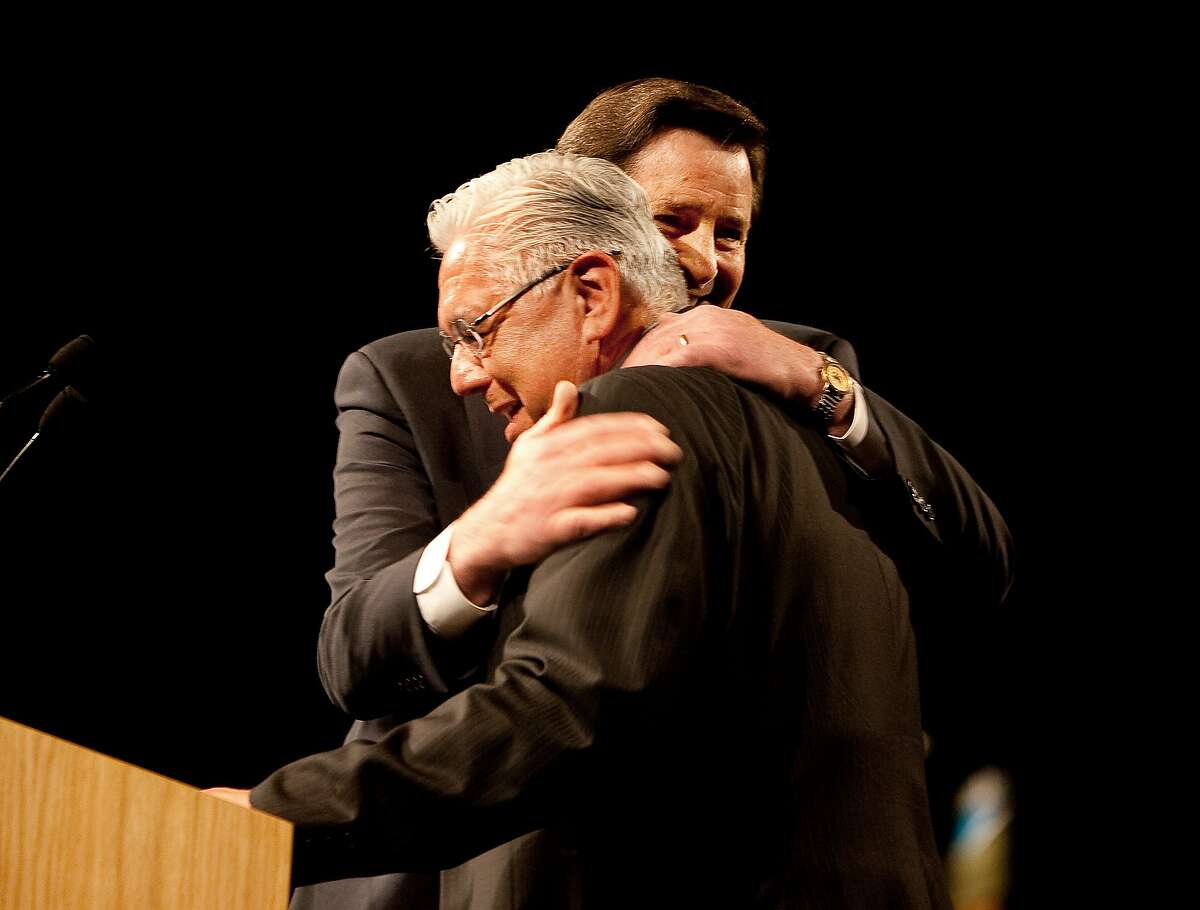John Garamendi, right, state lieutenant governor, hugs Art Torres, outgoing chairman of the California Democratic Party, after Garamendi spoke at the state convention in Sacramento April 25, 2009. Garamendi may be running for congress.