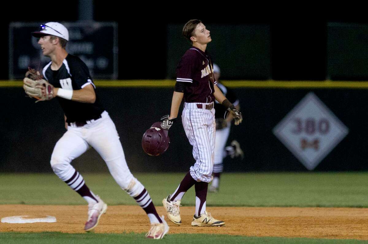 Bradley Baughman #17 of Magnolia West reacts after a ground ball by Cody Windisch ended the sixth inning of a District 20-5A high school baseball game, Friday, April 21, 2017, in Magnolia.