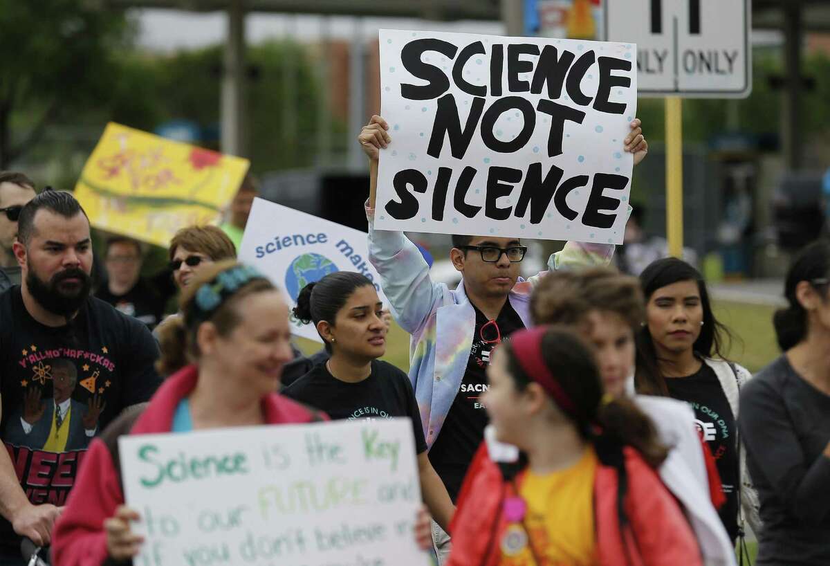 A crowd gathers to "March for Science" at San Pedro Springs Park on Saturday, Apr. 22, 2017 in conjunction with Earth Day and with other marches planned around the country including Washington, D.C. "We wanted to make today a day to highlight, to celebrate and to protect scientific research and education in San Antonio and beyond," said march organizer Sarah Stafford. The march started at the park and wound around the San Antonio College campus and at one point marchers passed the Scobee Education Center which houses a planetarium as well as the Challenger Center which provides students in science, technology, engineering and math (STEM) programs a hands-on approach to solving real-world problems. The march concluded with speakers from the field to science as the crowd cheered, "Science not silence!" (Kin Man Hui/San Antonio Express-News)