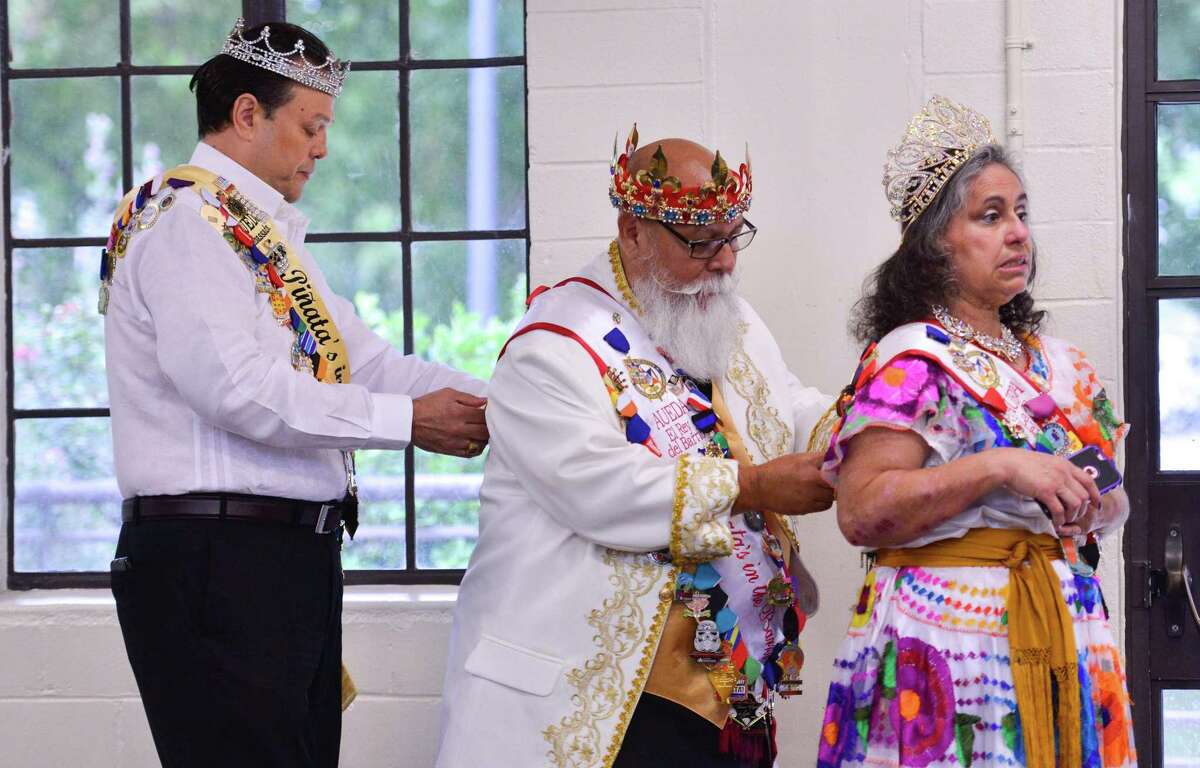 Getting ready for Saturday's Celebrations of Traditions Pow Wow is (left to right) Paul Martinez, Steve Duran, and his wife Virginia. The pow wow, and official Fiesta evvent, was at the Woodlawn gym and celebrates tribal traditions, culture, and opportunity.