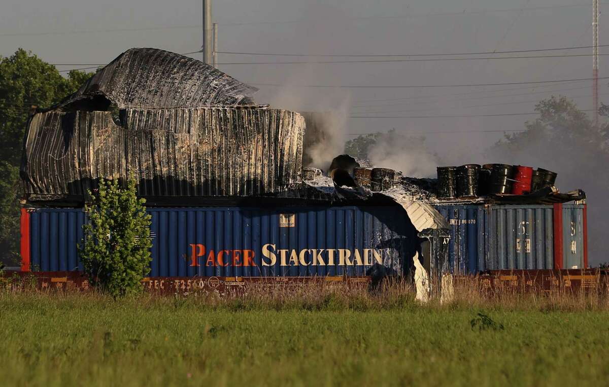 Train car fire involving chemicals draws crews north of downtown
