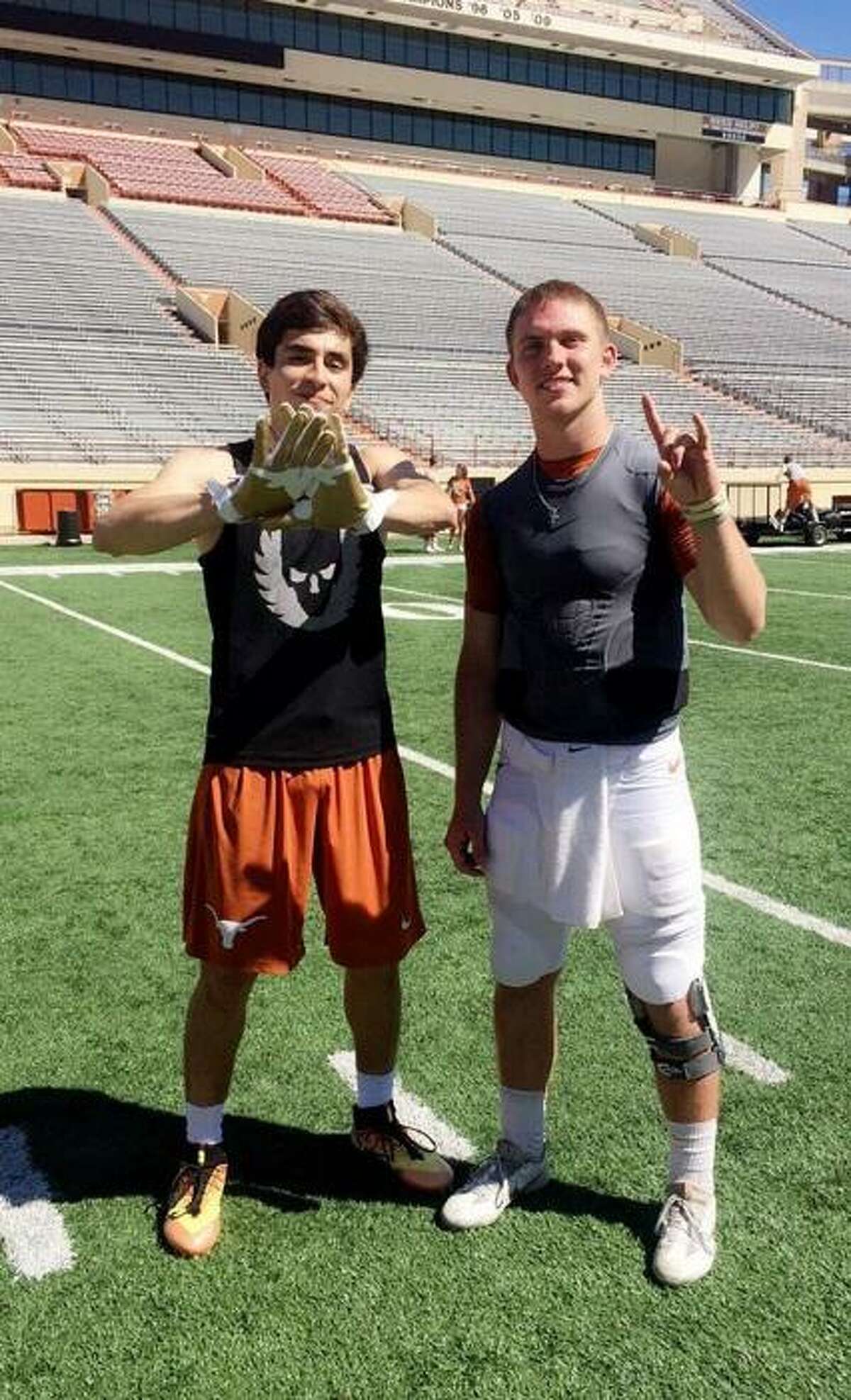 Justyn Betancourt, left, is pictured with Texas quarterback Shane Buechele at the Orange and White spring game. Betancourt could be catching passes from Buechele in the fall as he prepares to try out for the Longhorns at wide receiver.