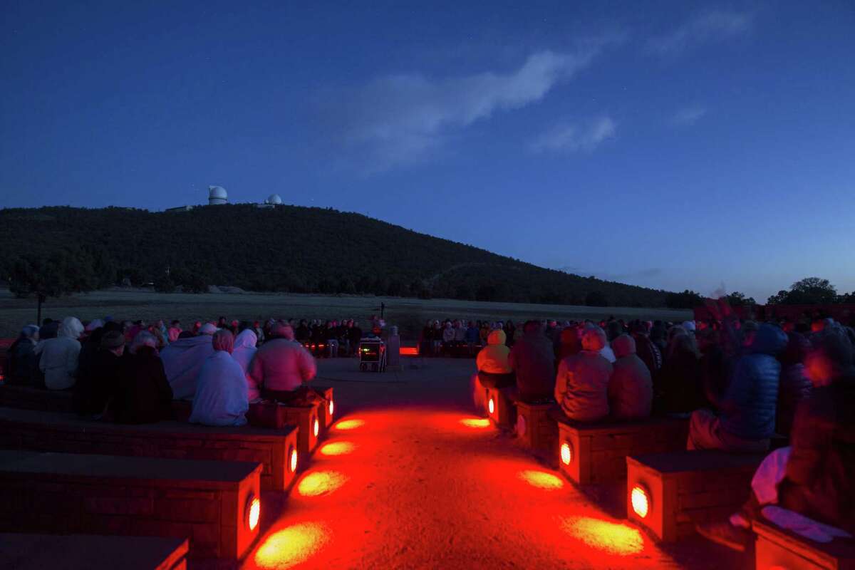 Hundreds of people gather at the McDonald Observatory near Fort Davis, Texas, for a star party on March 28.