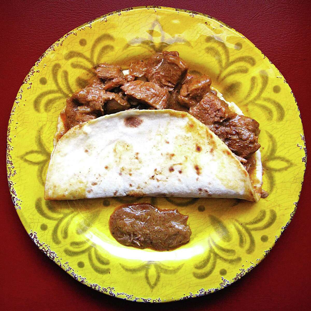 Carne guisada taco on a handmade flour tortilla from Norma's Place.